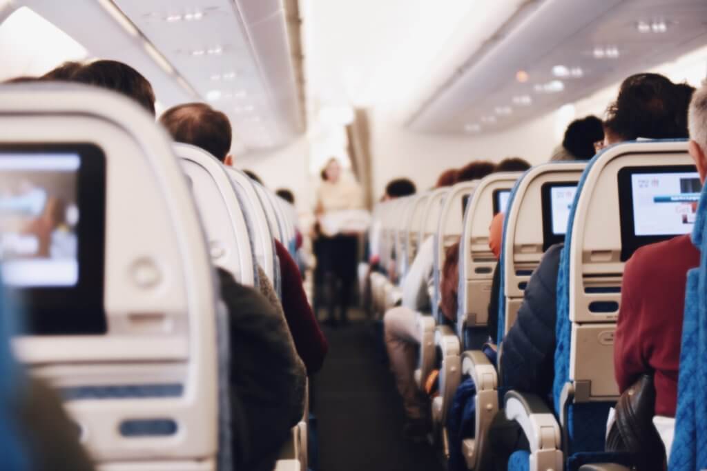 The inside of an airplane on a cheap flight.