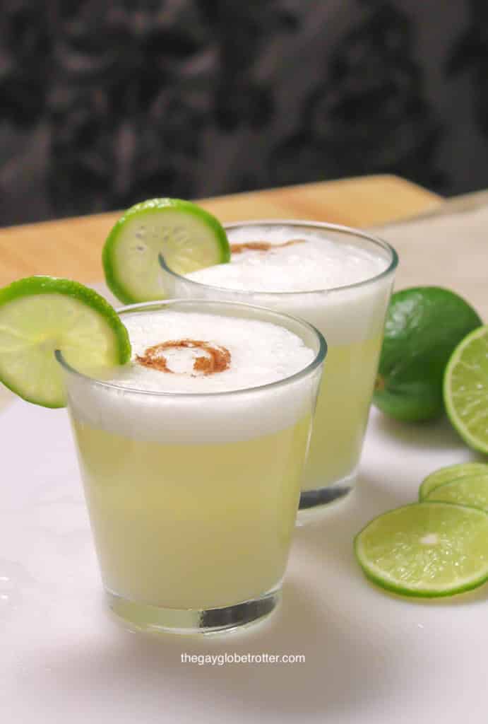 Classic Peruvian pisco sour recipe being made on a cutting board.