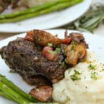 Red wine braised short ribs with mushrooms and pancetta.