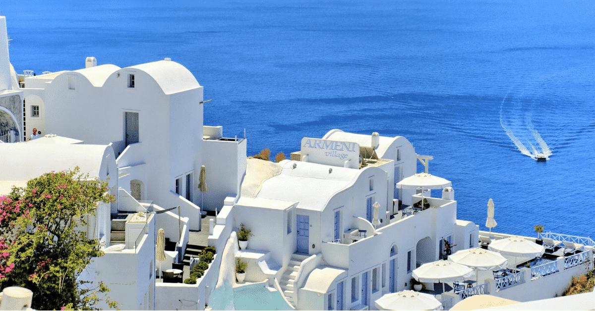 Blue ocean and iconic Greek architecture.