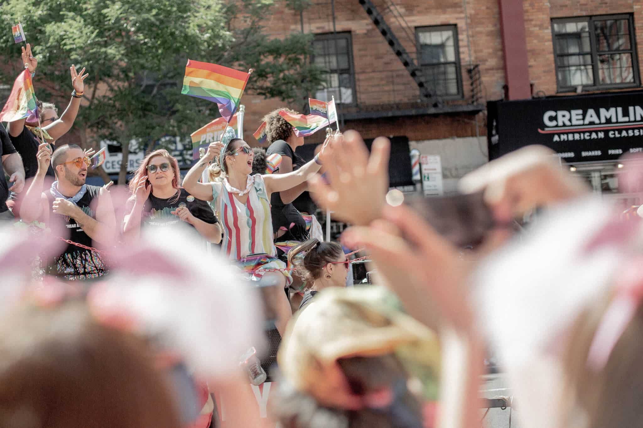 Lgbt Community Gay Club with Rainbow Flag on the Facade of a Brick