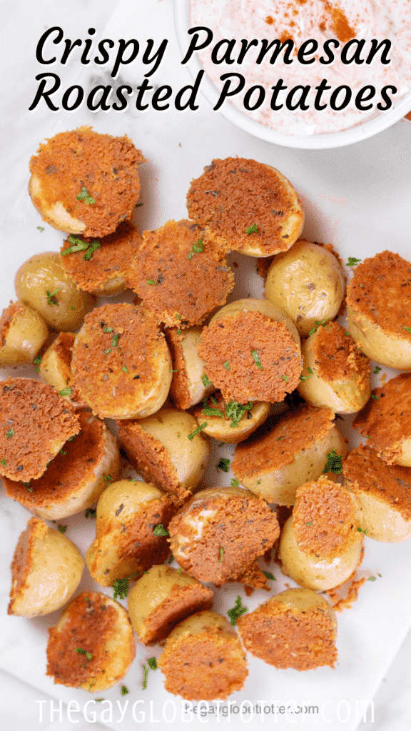 Crispy parmesan roasted potatoes with text overlay that reads "crispy parmesan roasted potatoes".