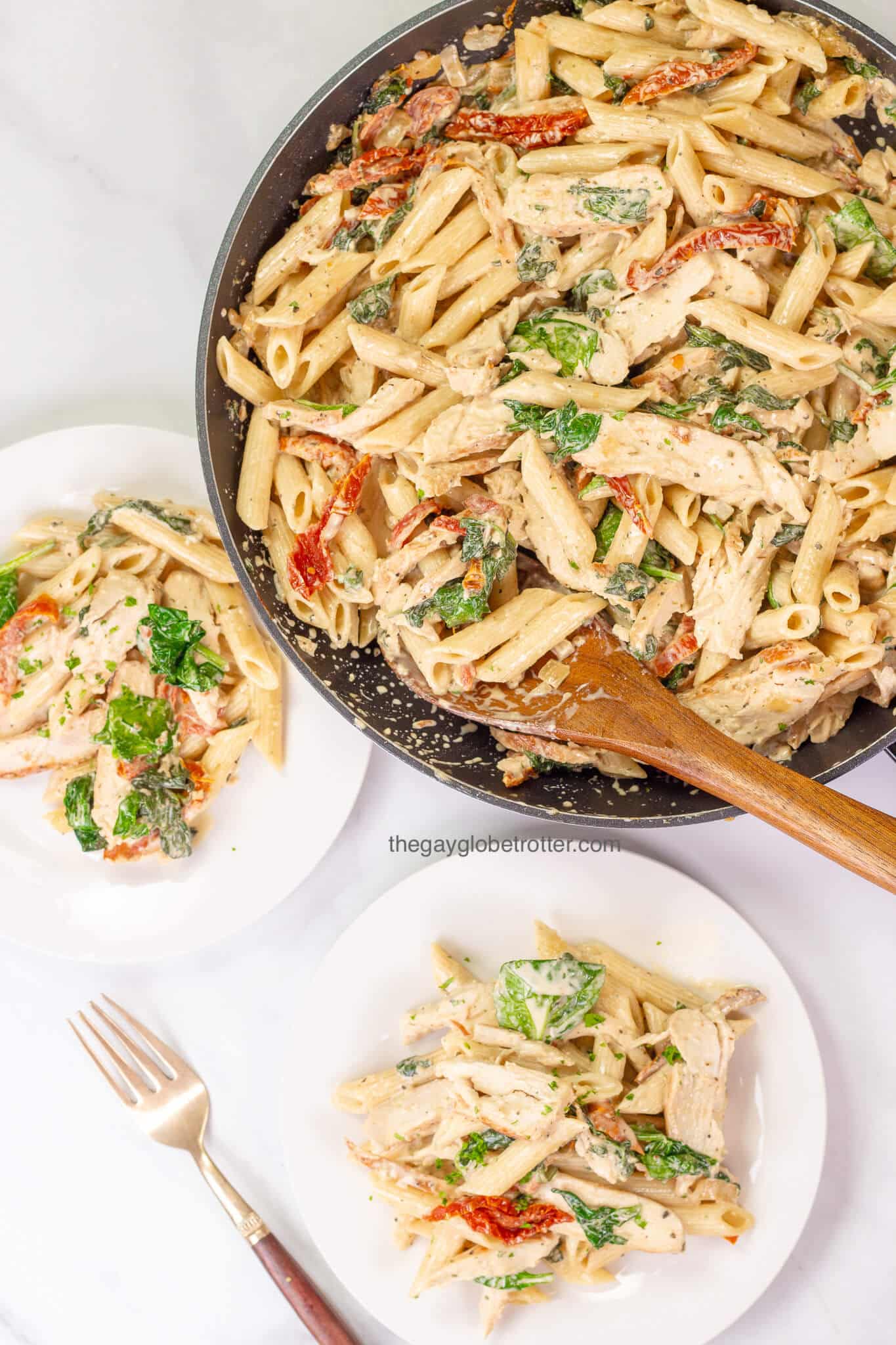 One Pot Creamy Tuscan Chicken Pasta The Gay Globetrotter