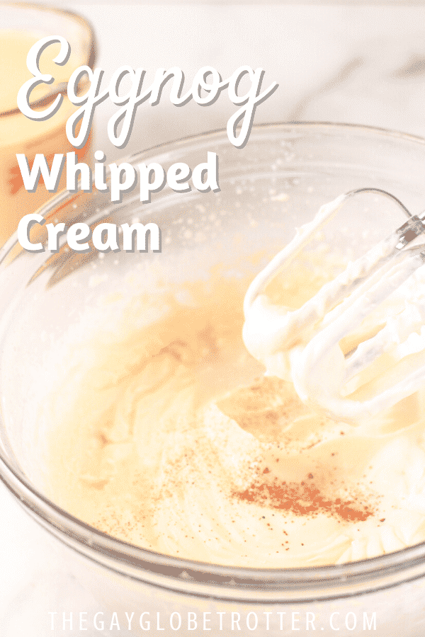 A bowl of eggnog whipped cream with text overlay that reads "eggnog whipped cream"