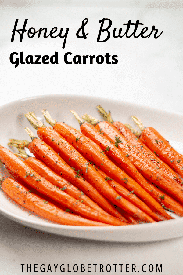 A serving platter piled with honey glazed carrots.