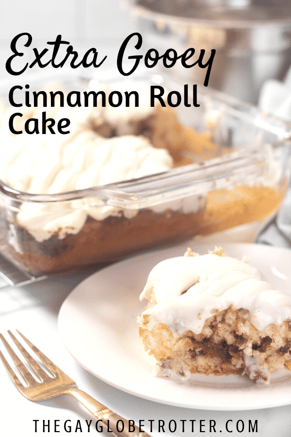 A plate of cinnamon roll cake with text overlay that reads "extra gooey cinnamon roll cake"