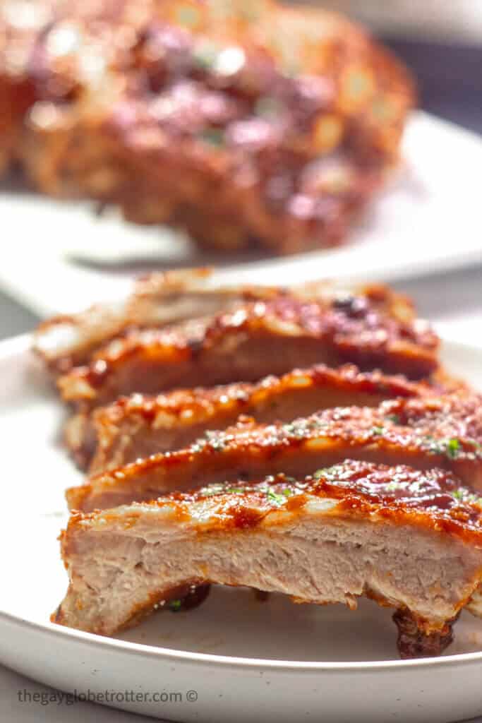 Ribs cut individually on a serving plate.