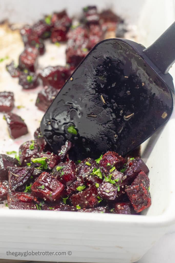 A spatula serving oven roasted beets.