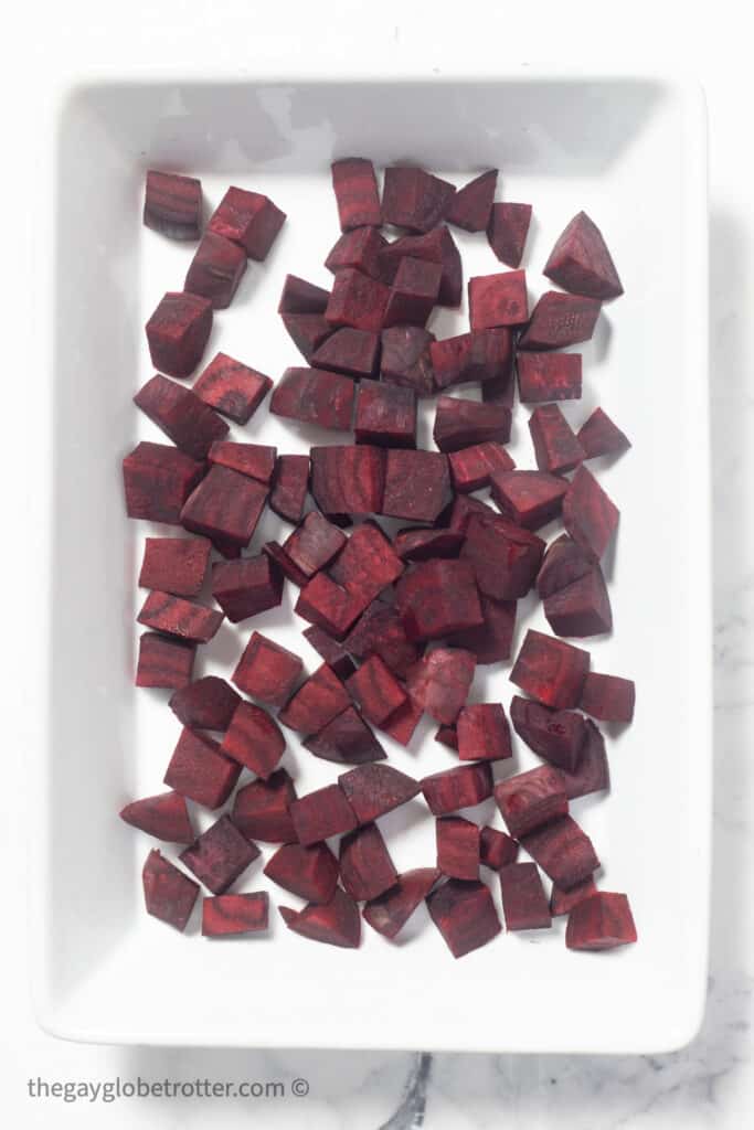 1" chunks of beets arranged in a baking dish. 