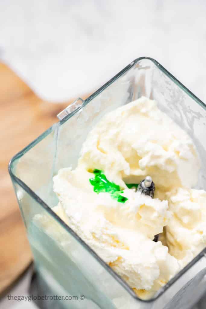 Shamrock shake ingredients in a blender.