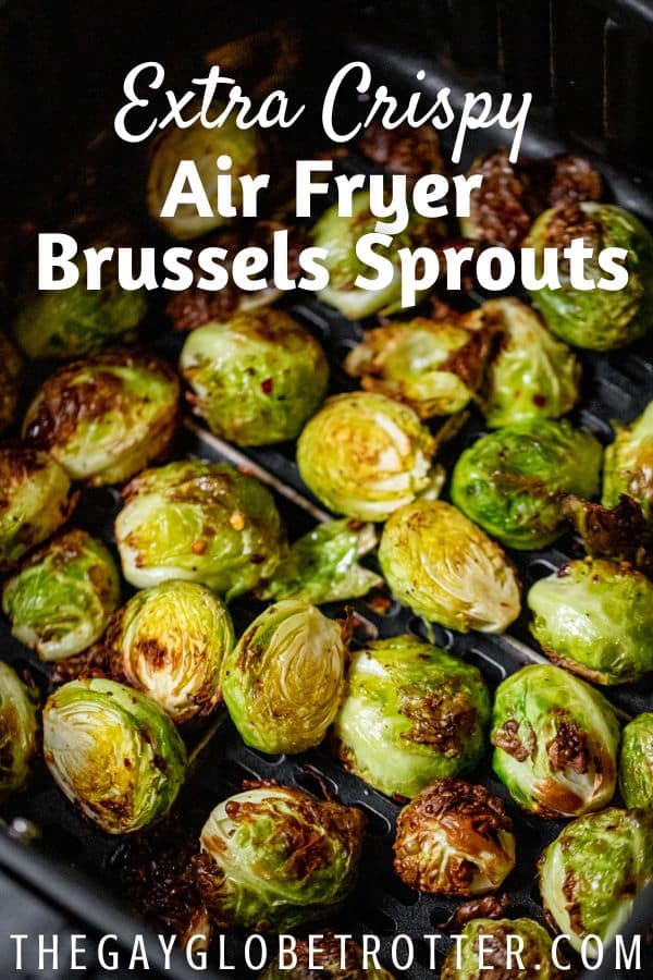 Brussels sprouts in an air fryer basket with text overlay.