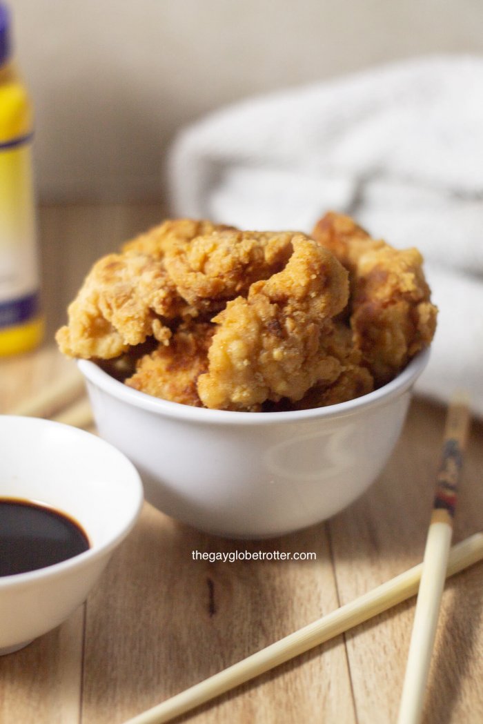 This delicious Korean fried chicken is easy, tender, and features a delicious Korean fried chicken sauce. It's perfect served over rice! #gayglobetrotter #koreanfriedchicken #friedchicken #asianfriedchicken #easyfriedchicken #koreanfriedchickenrecipe #koreanchicken