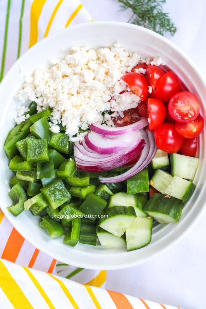 This homemade Greek salad recipe is topped with homemade Greek salad dressing for a fresh salad like no other!