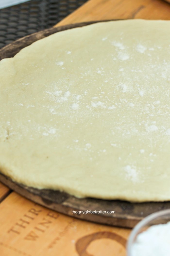 Italian Pizza Dough rolled out on a pizza stone.