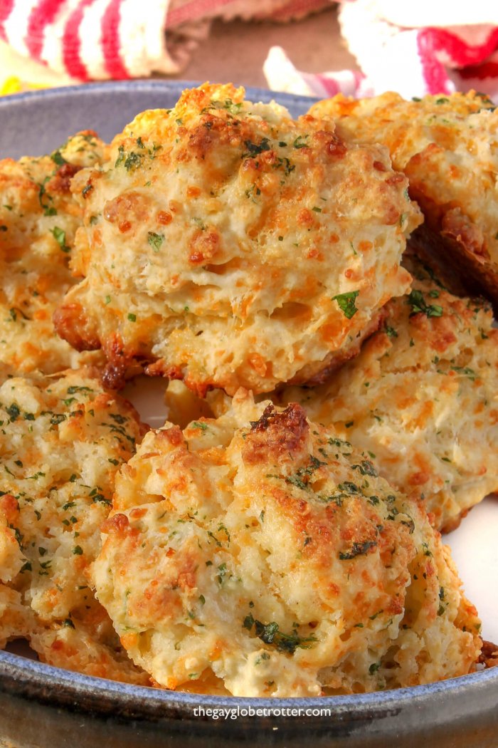 Cheddar bay biscuits on a plate.